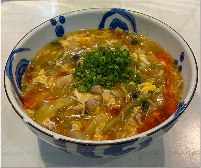 冷やし酸辣湯麺 マンゴー乗せ@さぬ一